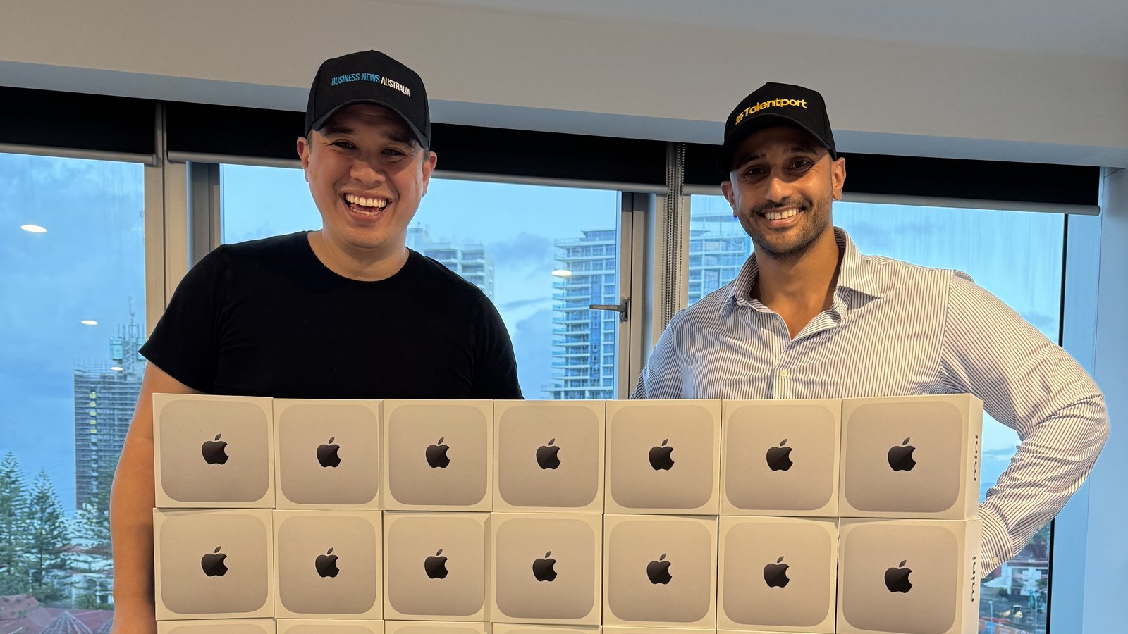 Luke and Bishoy in the Talentport office with Mac minis ready for AI Assist installations